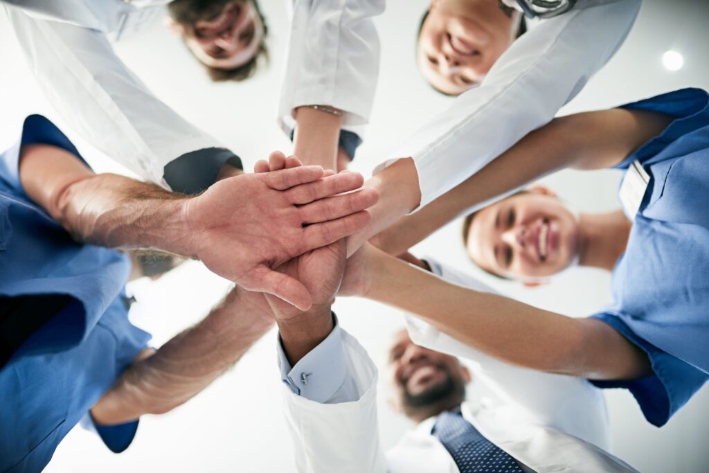 Bild von Personen beim Teamcoaching